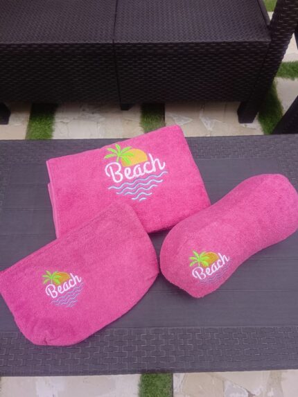 Embroidered Beach Towel with a pillow and a pouch